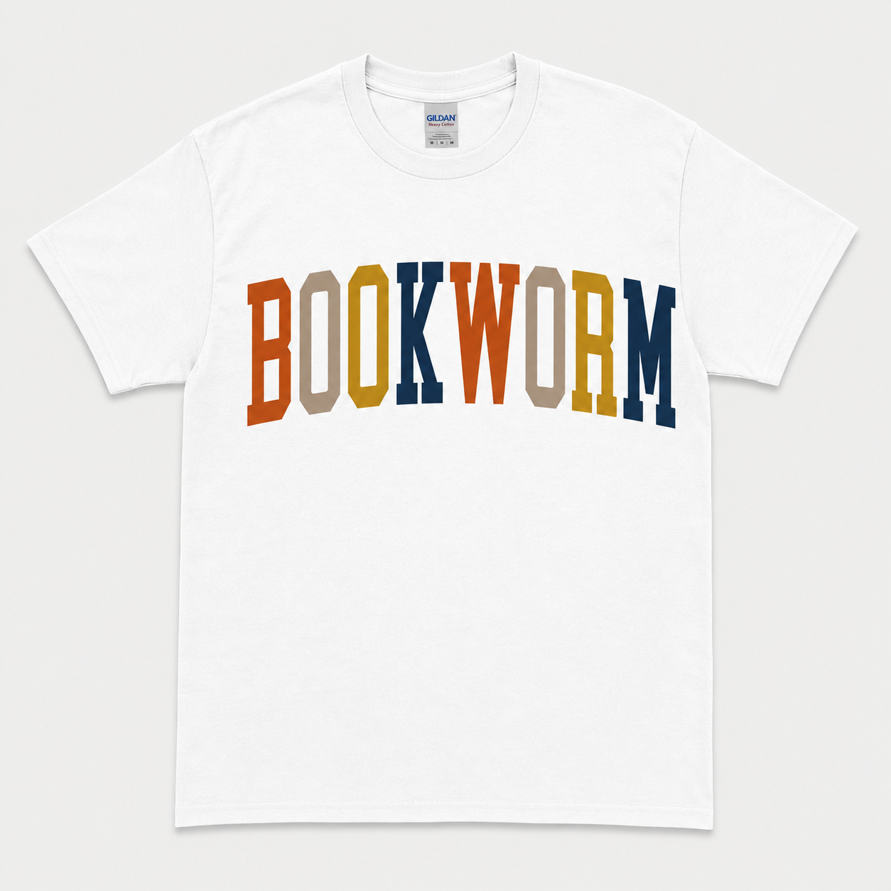 White Gildan T-shirt with “BOOKWORM” in orange, gold, navy, and neutral varsity lettering.